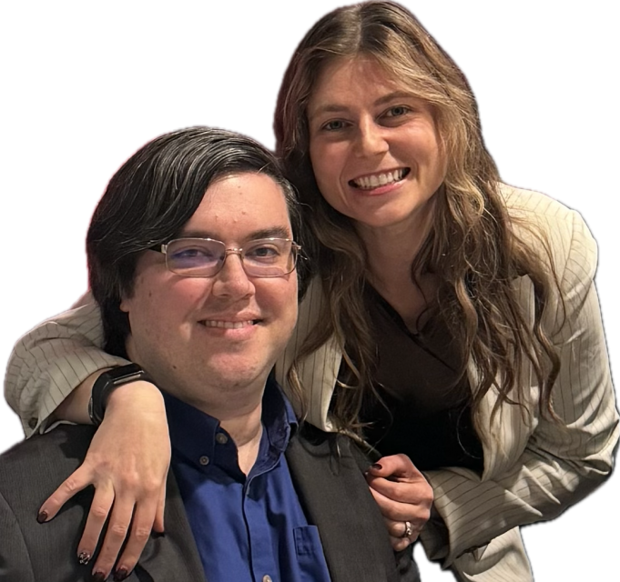 Mrs. Campbell and her husband smiling 